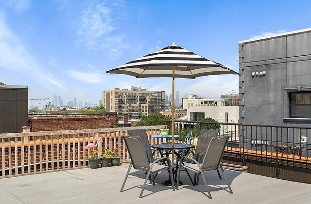 205 15th St Unit A6, New York City, NY 11215 - wooden deck with a view of skyline