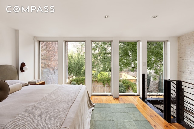 bedroom featuring wood-type flooring