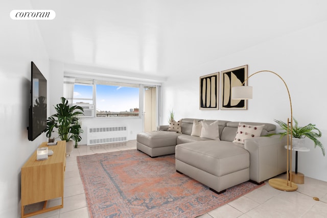185 Park Row Unit 17F, New York City, NY 10038 - living area with radiator heating unit, light tile patterned floors, and cooling unit