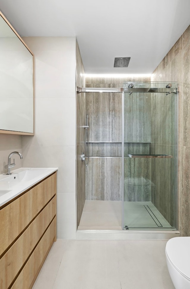 232 Eckford St Unit Ph-1, New York City, NY 11222 - full bath featuring a stall shower, toilet, vanity, and tile patterned floors