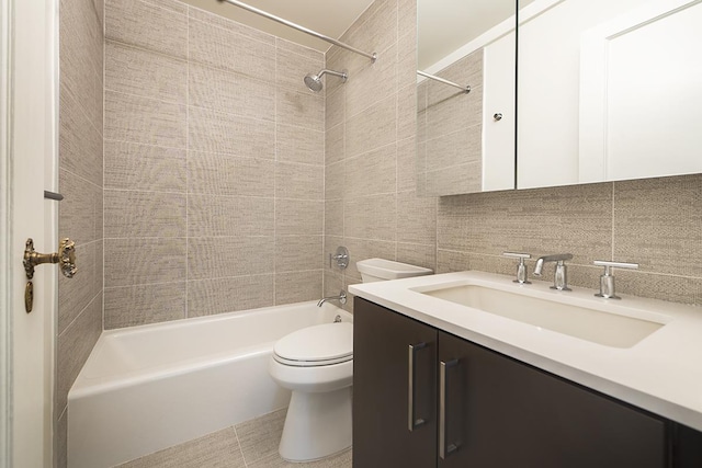 20 E 35th St Unit 4-A, New York City, NY 10016 - full bathroom with toilet, shower / bath combination, vanity, tile walls, and decorative backsplash