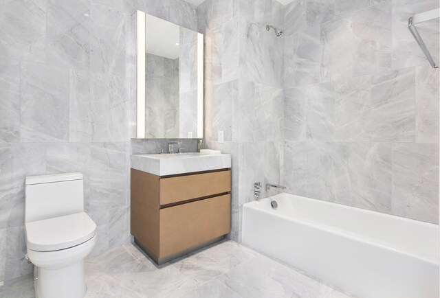 15 Hudson Yards Unit 31A, New York City, NY 10001 - full bath with tile walls, vanity, toilet, and washtub / shower combination