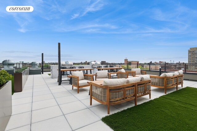 428 E 9th St Unit 411, New York City, NY 11218 - view of patio / terrace featuring outdoor lounge area and a city view