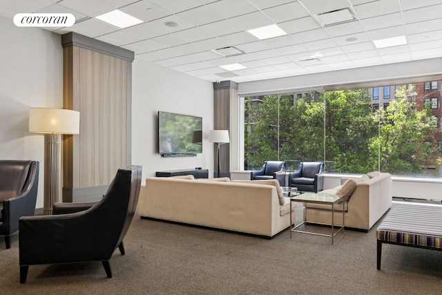 61 W 62nd St Unit 27G, New York City, NY 10023 - carpeted living area featuring healthy amount of natural light and a drop ceiling