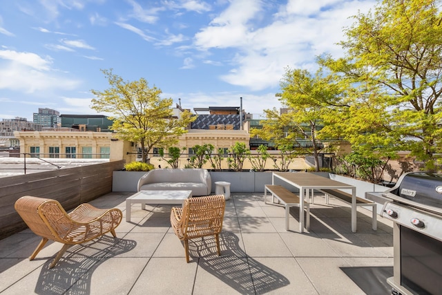 view of patio featuring a grill