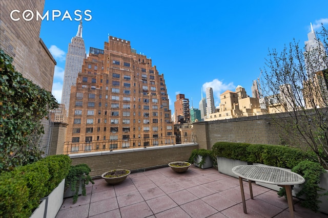 7 Park Ave Unit 66, New York City, NY 10016 - view of patio / terrace featuring a view of skyline and a balcony