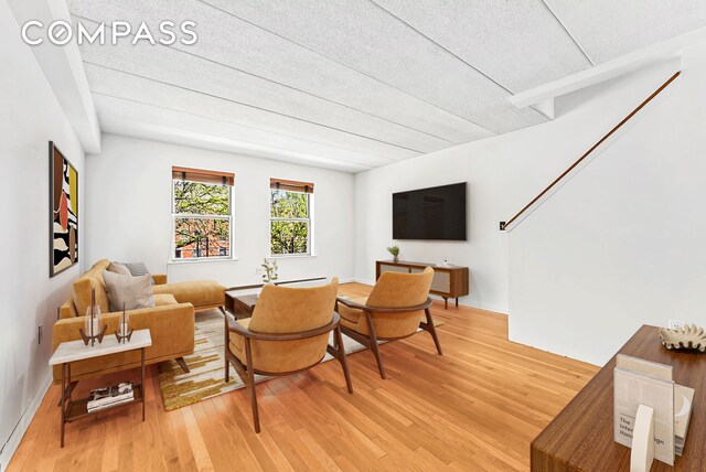 living area featuring light wood finished floors