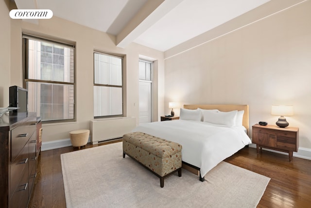 bedroom with beamed ceiling, dark wood-style floors, baseboards, and radiator