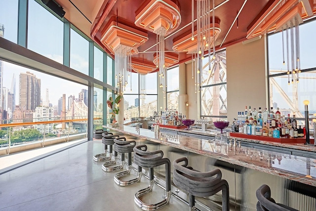 425 Main St Unit 4-C, New York City, NY 10044 - indoor dry bar featuring a view of skyline
