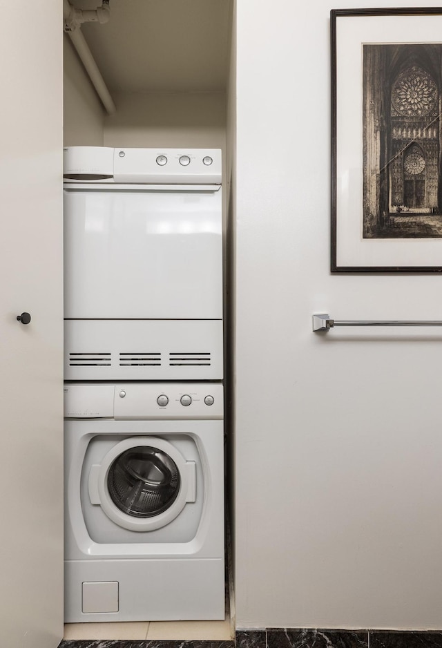 425 Main St Unit 4-C, New York City, NY 10044 - laundry room featuring stacked washer / drying machine