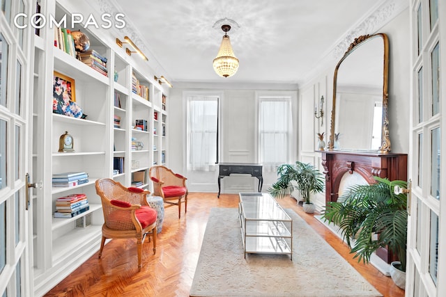 47 Fort Washington Ave Unit 55, New York City, NY 10032 - living area featuring a decorative wall, ornamental molding, and built in features