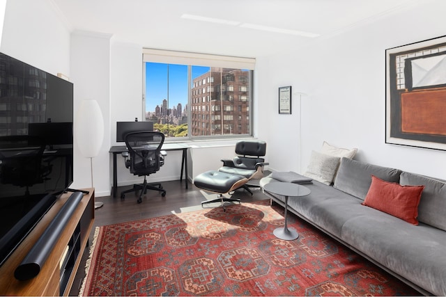 225 W 60th St Unit 14E, New York City, NY 10023 - living room with wood finished floors, a skyline view, an office area, and ornamental molding