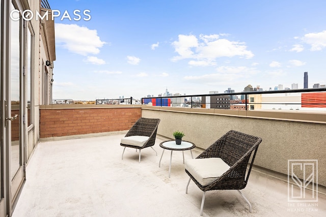 balcony featuring a view of city