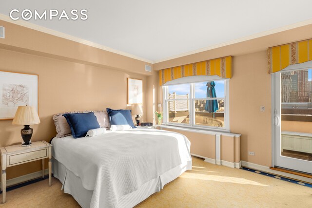 bedroom with baseboards, ornamental molding, light colored carpet, and visible vents