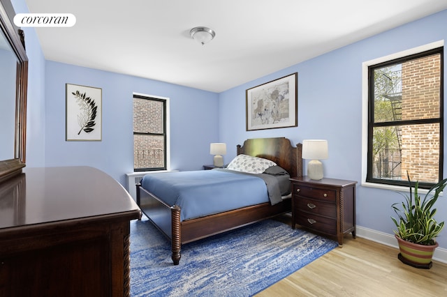 96 Arden St Unit 6K, New York City, NY 10040 - bedroom featuring light wood-type flooring and baseboards