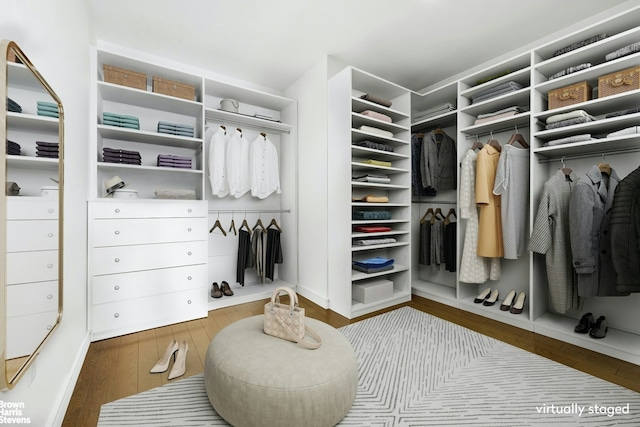 spacious closet with wood finished floors