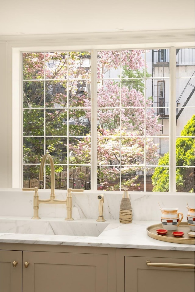 38 Garfield Place, New York City, NY 11215 - kitchen view of a sink, light stone countertops, and gray cabinetry