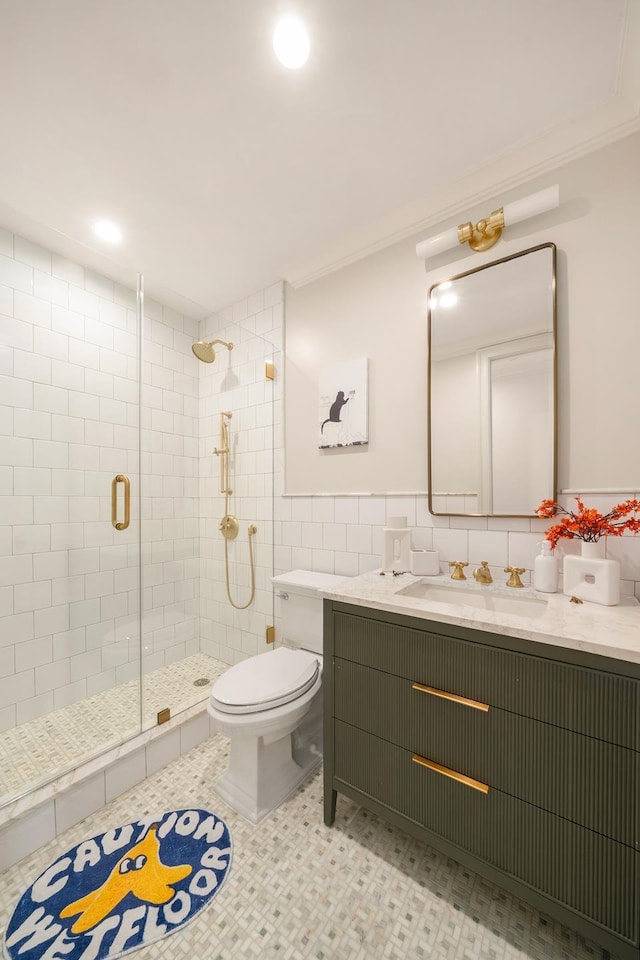 38 Garfield Place, New York City, NY 11215 - full bathroom with vanity, a stall shower, toilet, tile walls, and ornamental molding