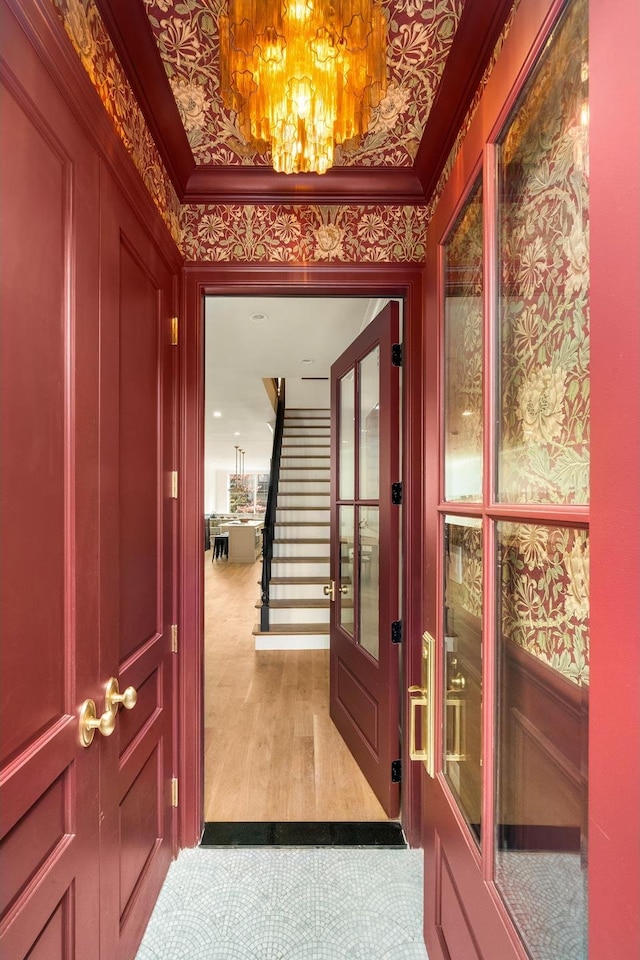 38 Garfield Place, New York City, NY 11215 - foyer entrance with a chandelier, crown molding, stairs, and wood finished floors