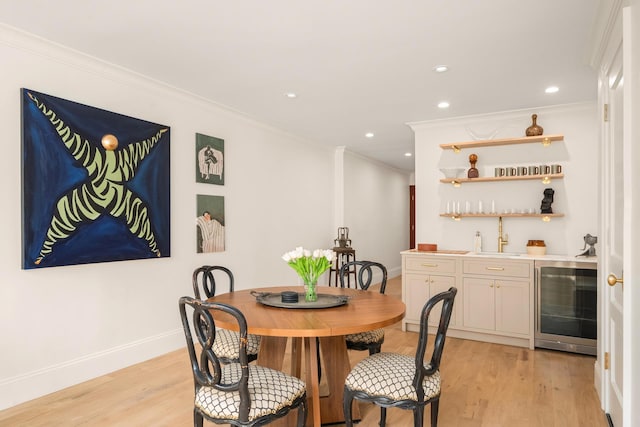38 Garfield Place, New York City, NY 11215 - dining room with wine cooler, bar with sink, ornamental molding, recessed lighting, and baseboards