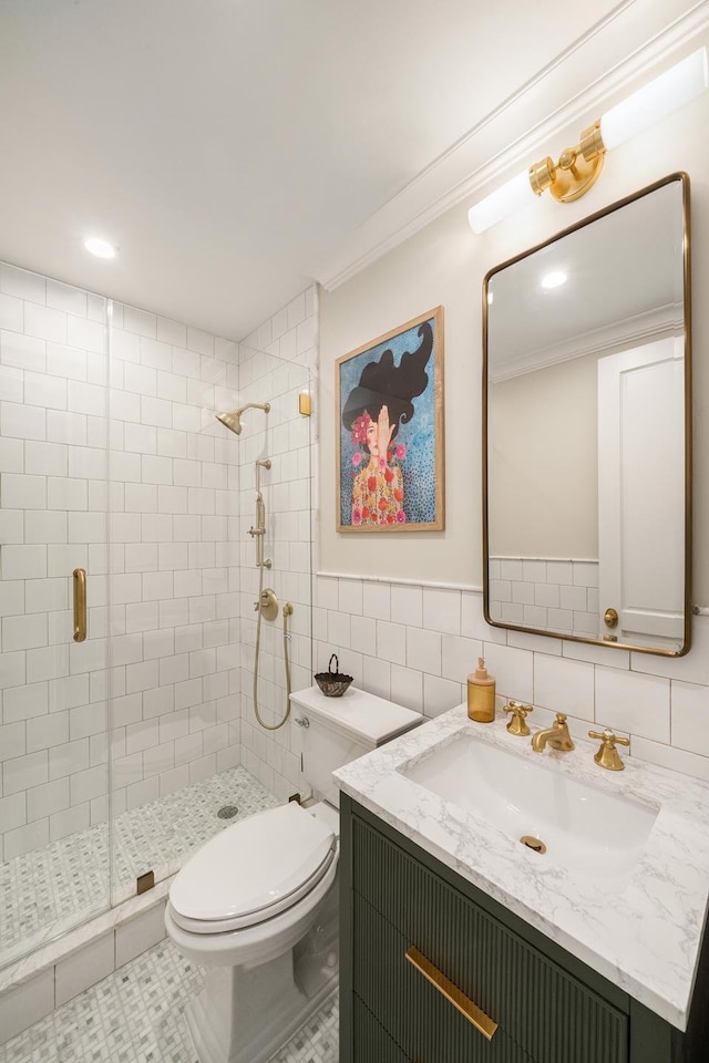 38 Garfield Place, New York City, NY 11215 - bathroom featuring a stall shower, vanity, crown molding, toilet, and tile walls
