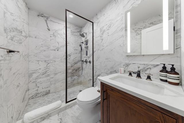 full bathroom featuring vanity, marble finish floor, a marble finish shower, and toilet