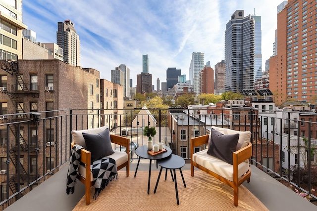 balcony featuring a view of city