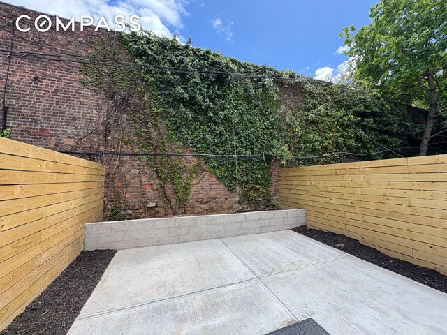 view of patio / terrace featuring a fenced backyard