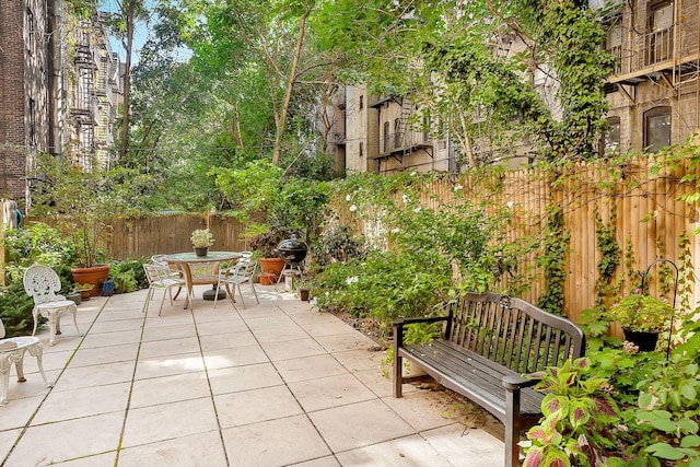 206 E 90th St Unit 4W, New York City, NY 10128 - view of patio / terrace featuring outdoor dining space and grilling area