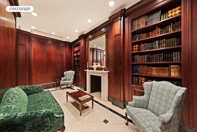 sitting room featuring light tile patterned floors, built in features, recessed lighting, and visible vents