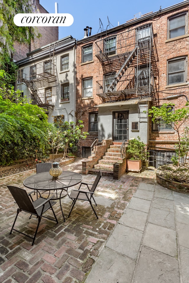113 W 15th St Unit 1E, New York City, NY 10011 - view of patio with stairway