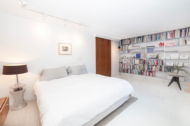 bedroom with track lighting