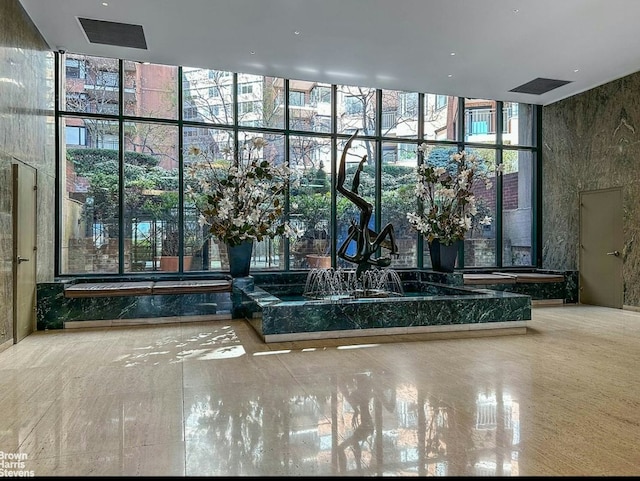 60 Sutton Pl S Unit 3Kn, New York City, NY 10022 - building lobby featuring a wall of windows