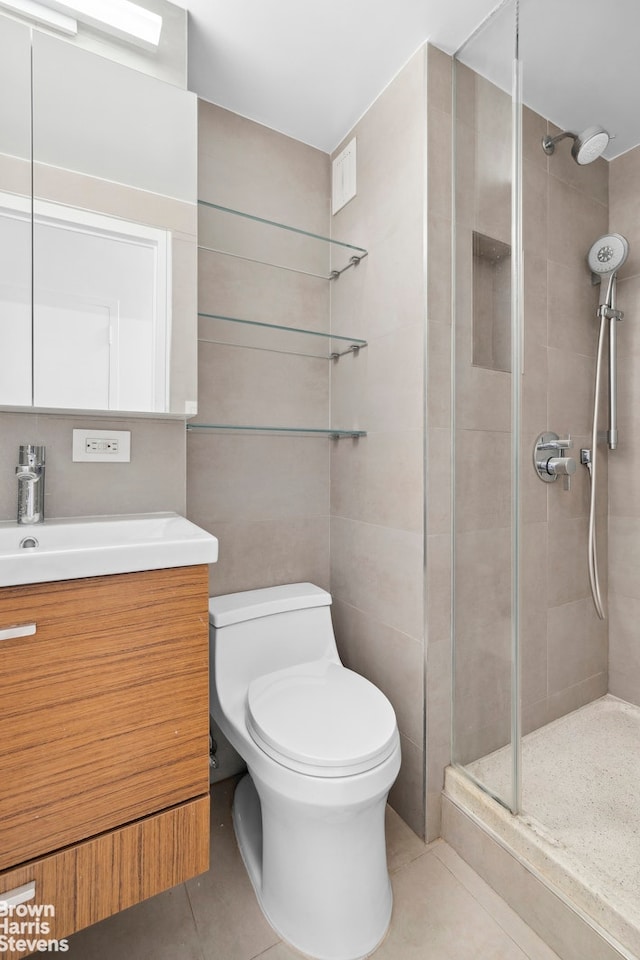 60 Sutton Pl S Unit 3Kn, New York City, NY 10022 - bathroom featuring a shower stall, vanity, toilet, and tile patterned floors