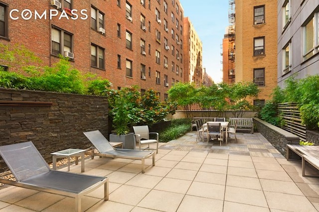 545 W 110th St Unit 5A, New York City, NY 10025 - view of patio / terrace with outdoor dining area and cooling unit