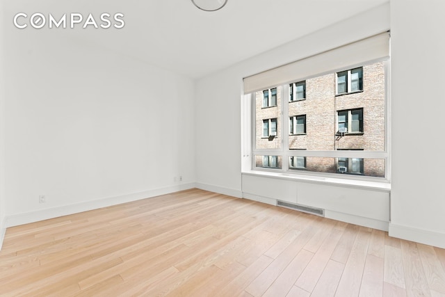 545 W 110th St Unit 5A, New York City, NY 10025 - empty room featuring wood finished floors and baseboards