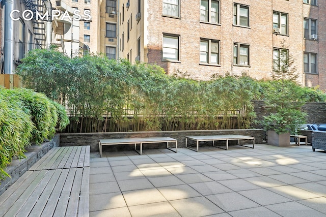 view of community with a patio area