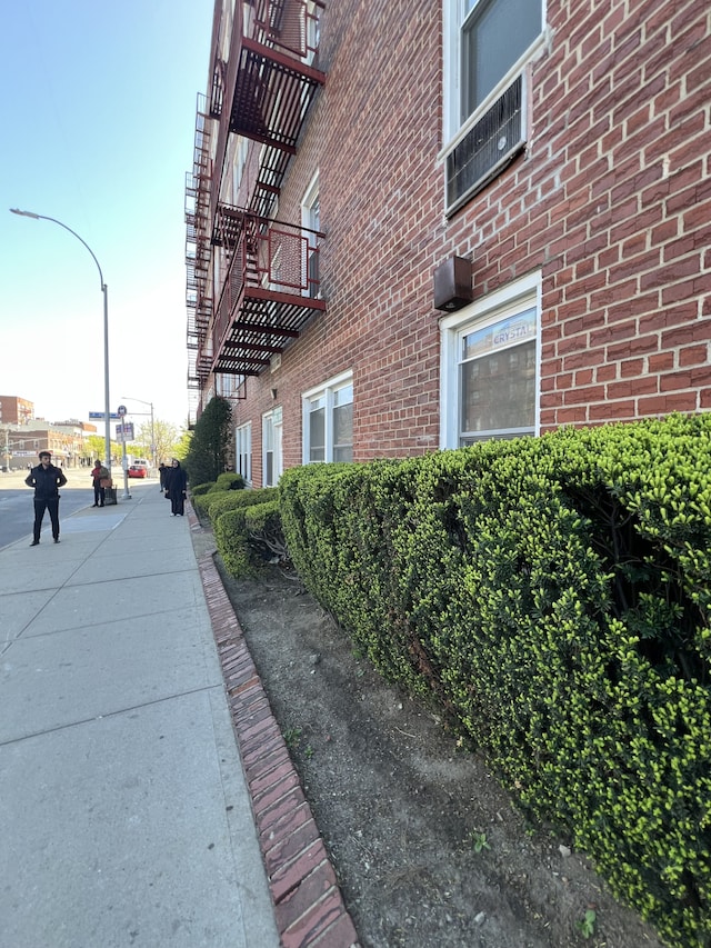 view of home's exterior with brick siding
