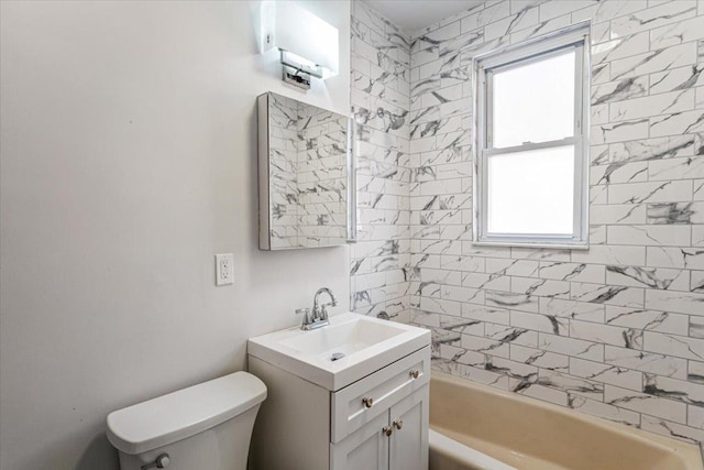 full bathroom featuring shower / bathtub combination, toilet, and vanity
