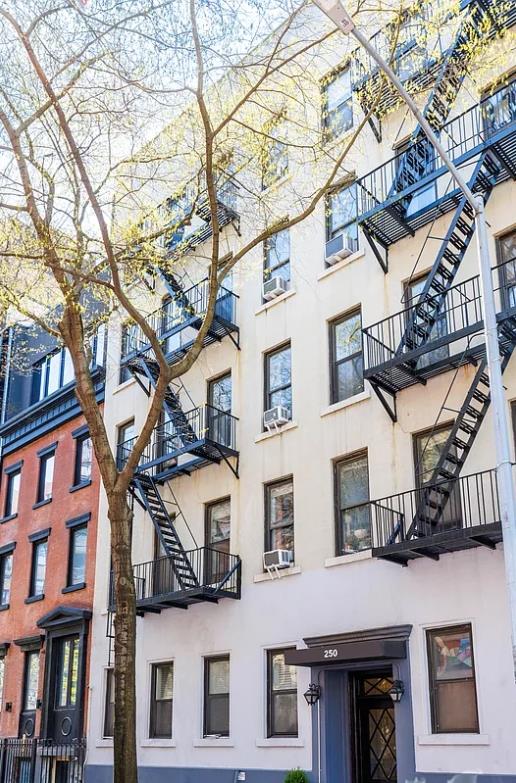250 W 22nd St Unit 1-B, New York City, NY 10011 - view of apartment building / complex with cooling unit