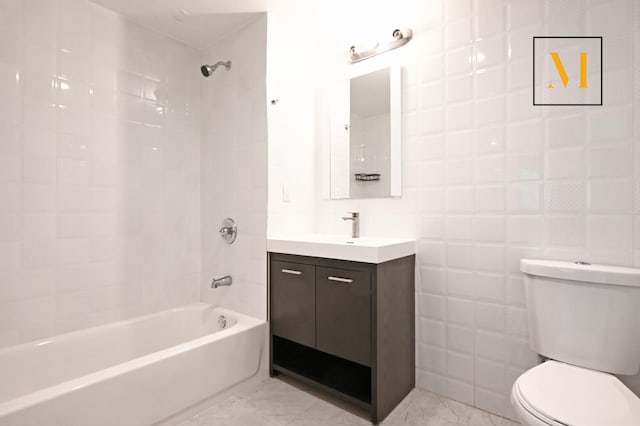 full bath with shower / tub combination, toilet, and vanity