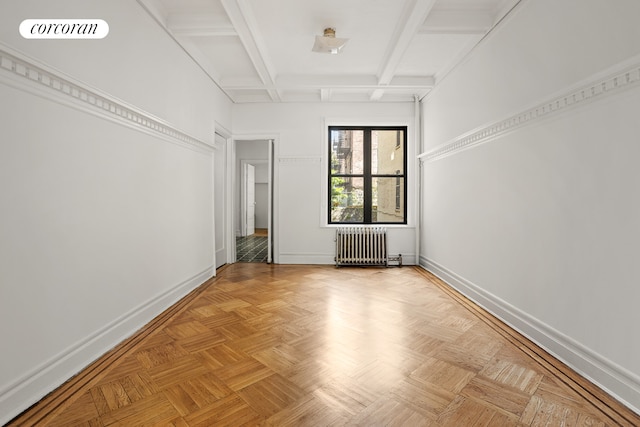 511 8th Ave, New York City, NY 11215 - unfurnished room featuring beam ceiling, radiator heating unit, baseboards, visible vents, and coffered ceiling
