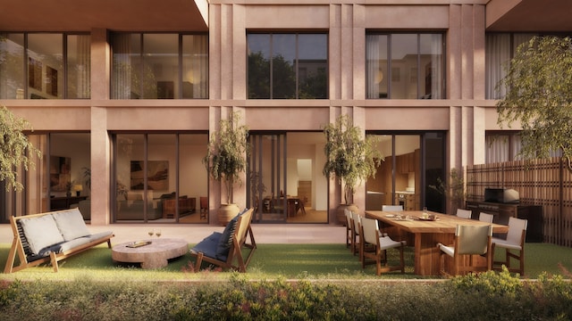 exterior space featuring a patio, stucco siding, and outdoor dining space