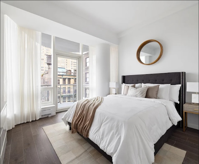 bedroom with wood finished floors