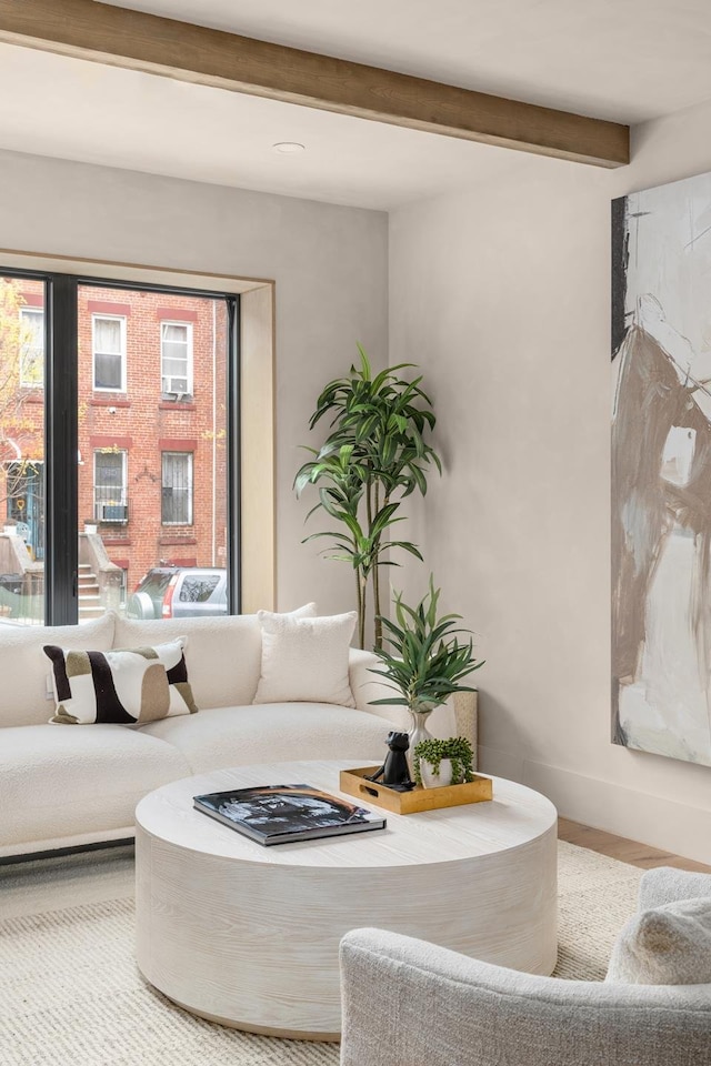 359 13th St Unit 1, New York City, NY 11215 - living room featuring beamed ceiling and wood finished floors