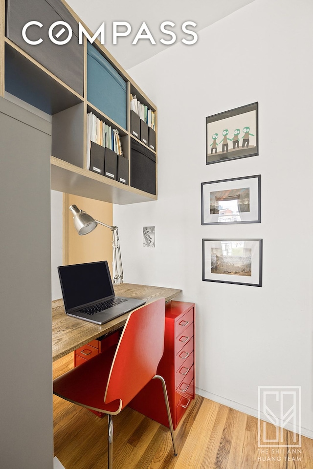 office space featuring wood finished floors