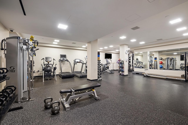 gym featuring recessed lighting