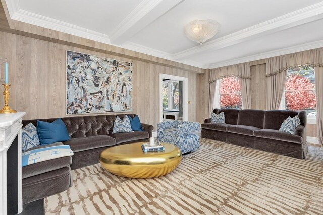 1133 Park Ave Unit 2W, New York City, NY 10128 - living area featuring crown molding, beamed ceiling, and a fireplace