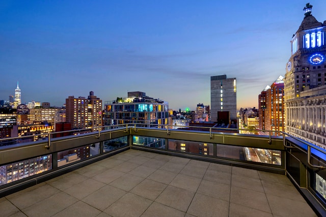 123 3rd Ave Unit Ph18, New York City, NY 10003 - patio terrace at dusk with a city view and a balcony