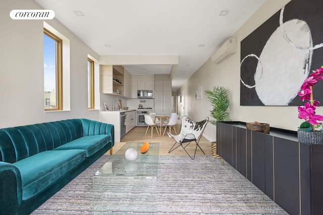 68 Eldert St Unit 3B, New York City, NY 11207 - living area with a wall mounted AC and light wood-type flooring
